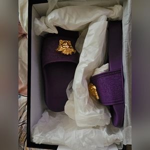 Purple Versacce slides with gorgeous gold accents. SIZE 36 and new in box.